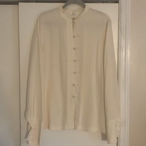 Gorgeous, cream colored 100% silk blouse from Talbots. Loop and knot buttons.